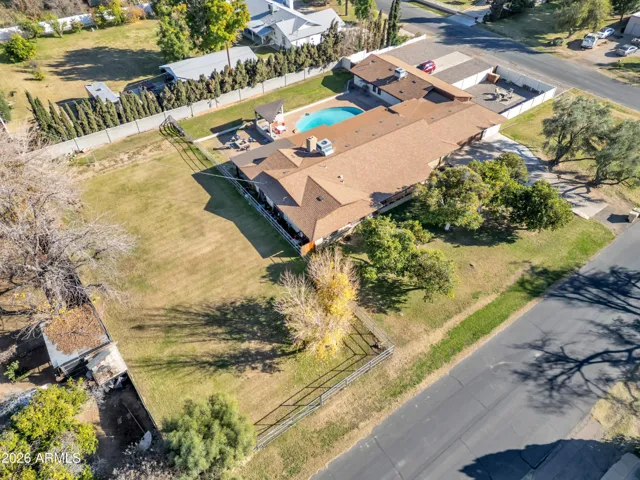 Expansive side yard zoned 100% Agricultural. Perfect for those dreaming of vineyards, citrus groves, vegetable gardens, horse, cow, sheep, or simply expansive open space for family and pets to roam.