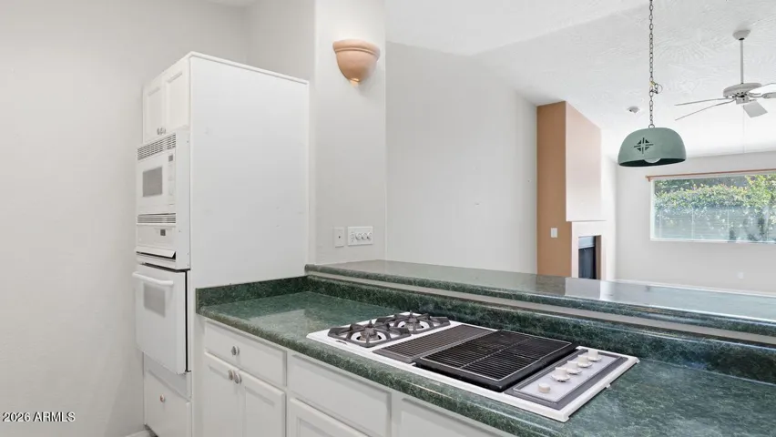 Cooking area allows for socializing with friends in the great room.
