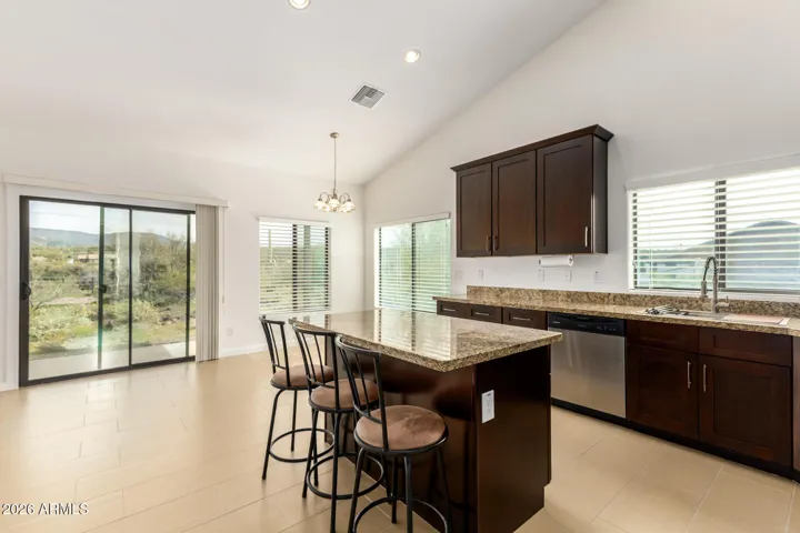 Granite & Stainless Kitchen with Breakfast Bar Island!