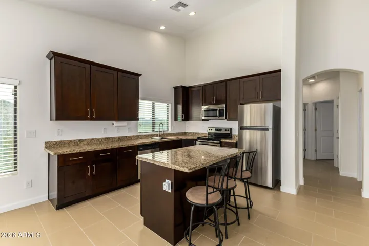 Kitchen with Brushed Nickel Hardware on Cabinets