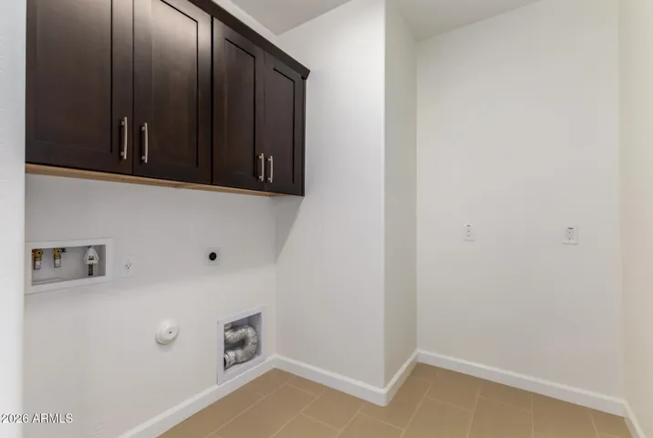 Laundry Room with Upper Cabinets & Room for a Refrigerator or Freezer!