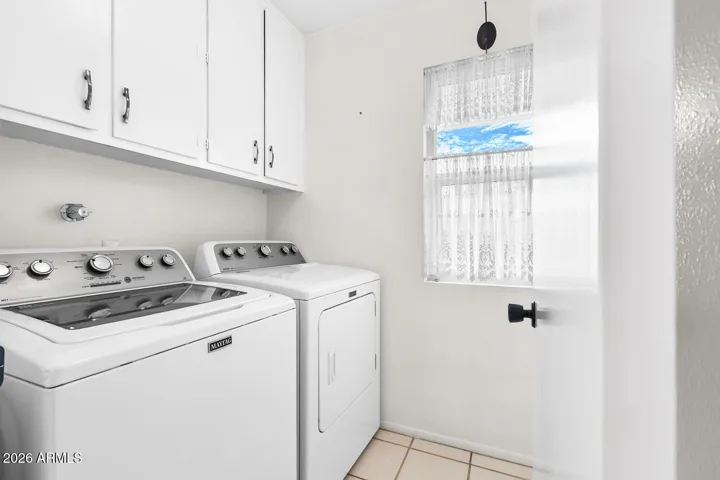 Indoor Laundry Room with Storage!