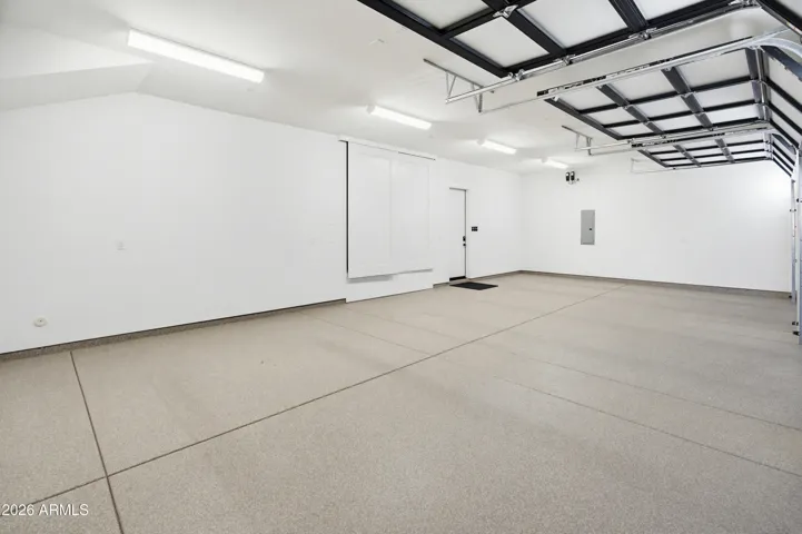 3 car garage with epoxy floors