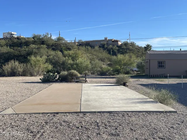 Great bonus lot with its own septic and concrete pad.