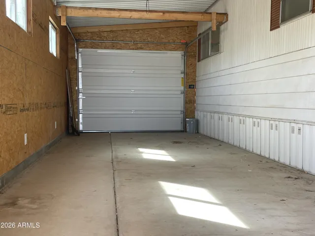 Deep garage that opens in the back of the property