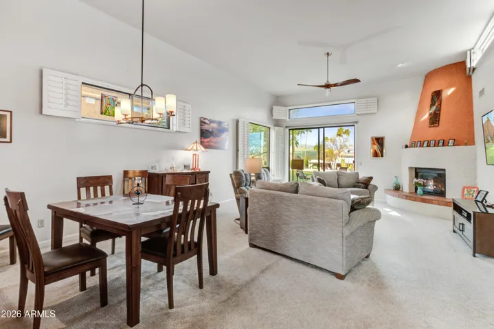 Enter the great room and immediately see the panoramic golf course and mountain views!