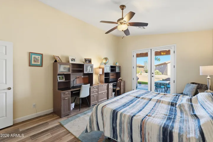 Large master with french doors to the back patio