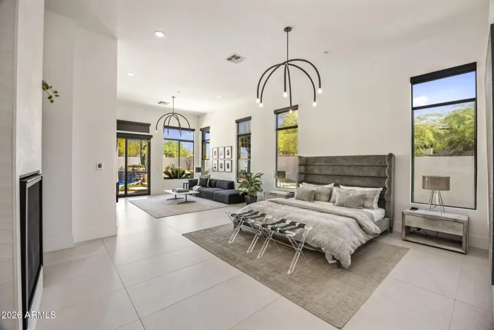 With fireplace, sitting area, access to patio with lots of windows!