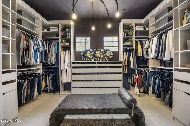 Custom walk-in closet with built-In cabinetry & Grasscloth finishes