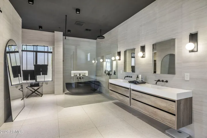 Spa-inspired design with custom tilework & soaking tub