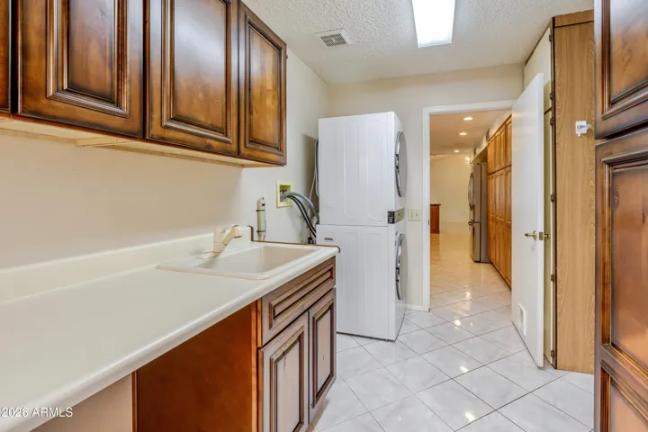 The updated laundry room has tons of storage.