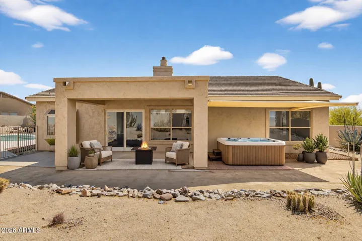 Large covered patio, with above ground Spa