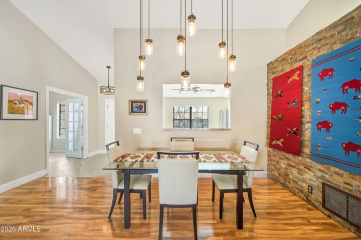 Dining room with rock wall