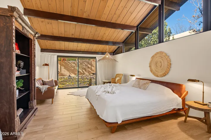 Beam and plank ceilings are showcased by high north facing windows.