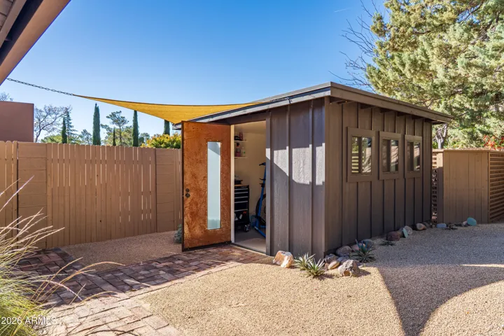 Custom built shed, designed with intention to work with the style of the home while providing extra storage or workspace.