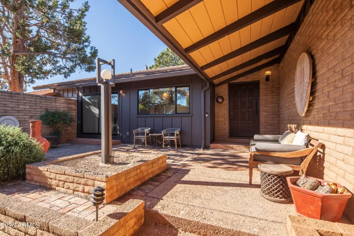 Hardscape patio, Zen garden with access to the kitchen via a slider make the front entry courtyard a functional and elegant space.
