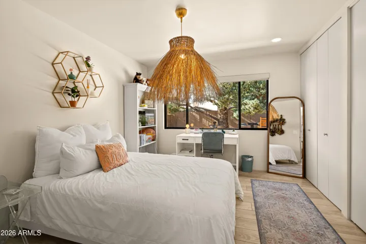 Another light filled bedroom, which could also be a fun yoga space, office, etc.