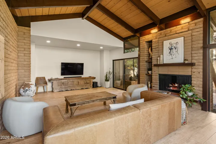 Fireplace with built in niches could provide a cozy setting for the occasional chilly evening.