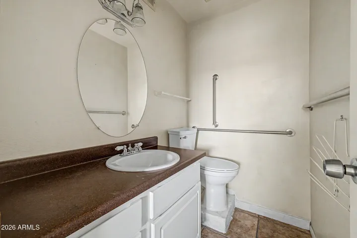 One-half Bathroom in Primary Bedroom.