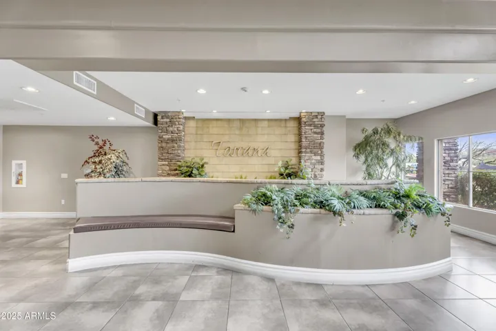 The impressive Toscana lobby welcomes residents with upscale finishes, stone accents, and thoughtfully designed seating areas. This well-appointed entry reflects pride of ownership and a refined residential experience.
