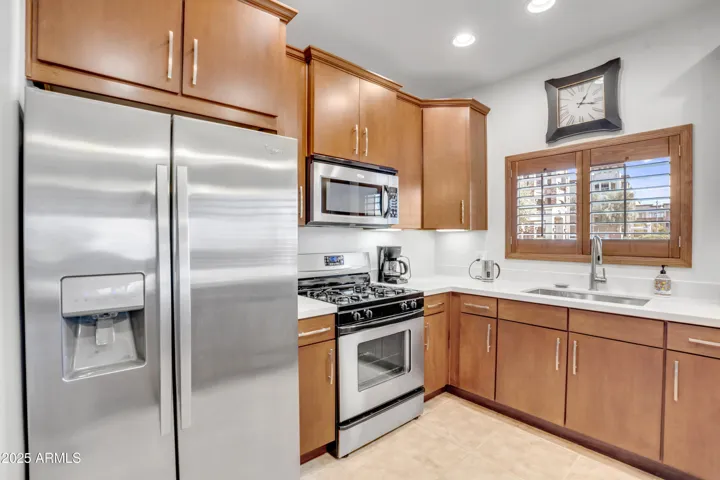 Located on the top floor, this private corridor leads directly to Unit 1419, offering quiet, secure access in this upscale Phoenix condo building with elevator convenience.