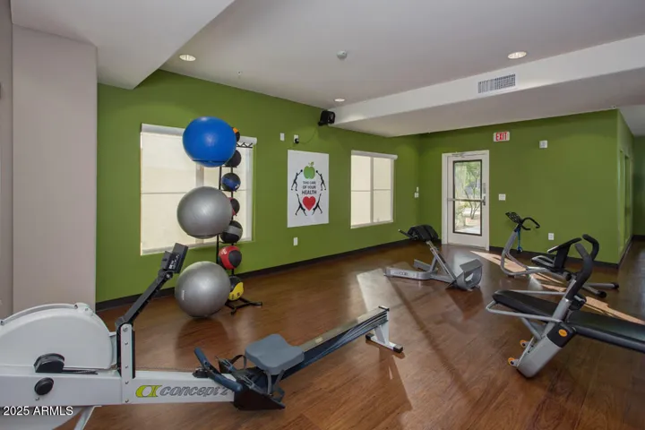Toscana’s modern fitness room includes cardio, free weights, and wellness equipment—supporting healthy, active living right at home in this amenity-rich community.