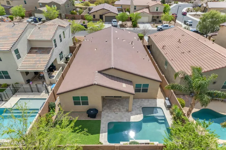 NICE! Backyard! Pool with water feature, travertine pavers.