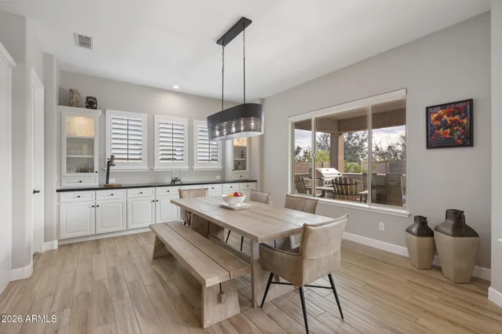 Eat-in Kitchen with cabinet storage space, counter space & walk in pantry.