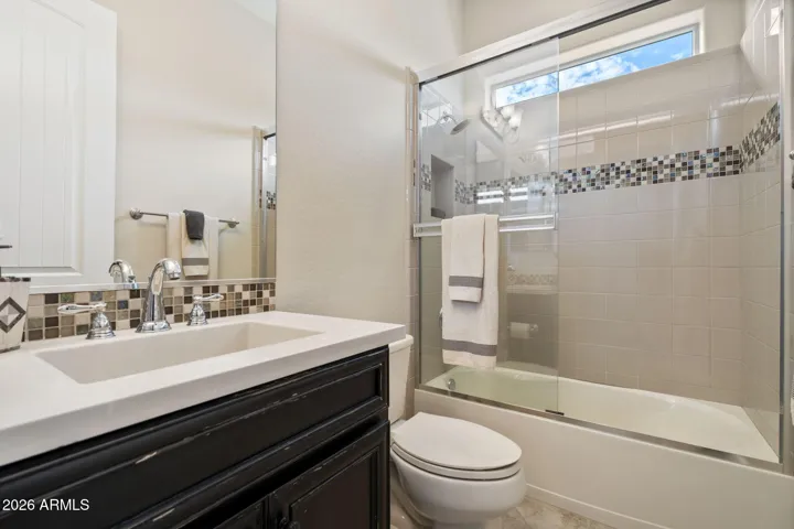 Ensuite Bathroom with tub & shower.
