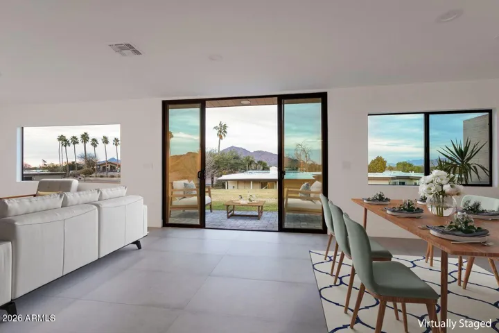 Door height increased to the ceiling, inviting limitless mountain & city views.