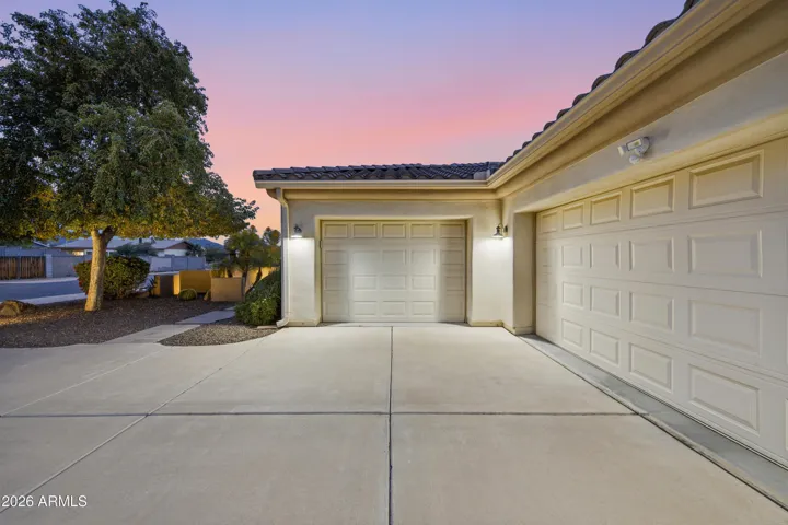 Separate side entry 1 car garage and 2 car garage