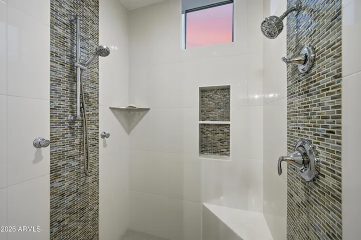 Custom closet with dual shower heads