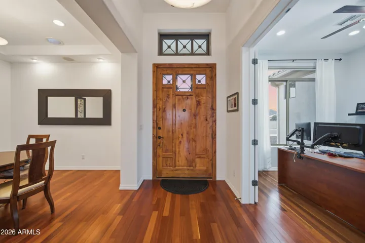 Beautiful door with custom security screen door.