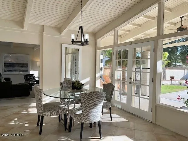 Dining open to back yard with a lot of natural light