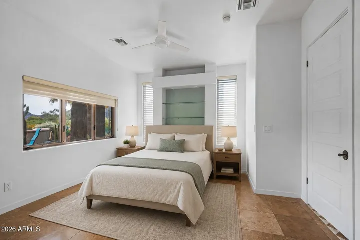 Virtually staged using AI - Guest House Bedroom and En Suite