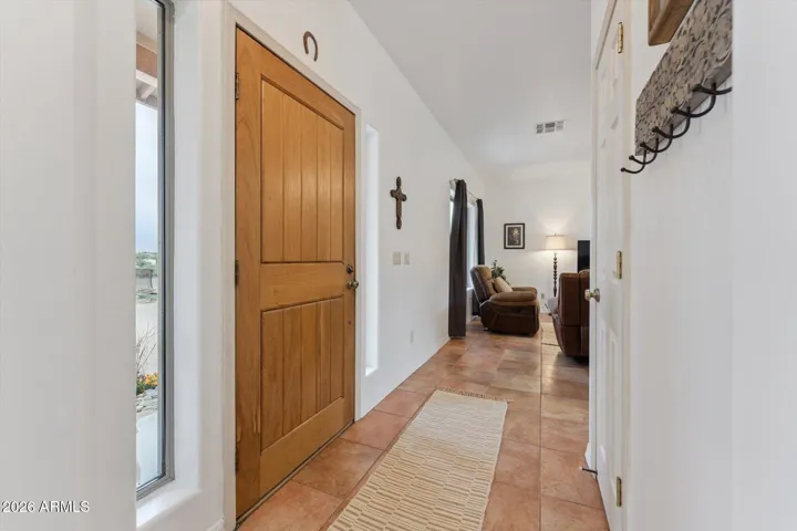 Come on in the front entryway and turn left to enter the open concept living room & dining room.