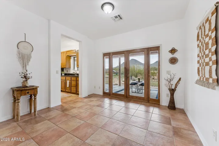 Delightful views of the mountains right from your living/dining room through the big double French-doors.