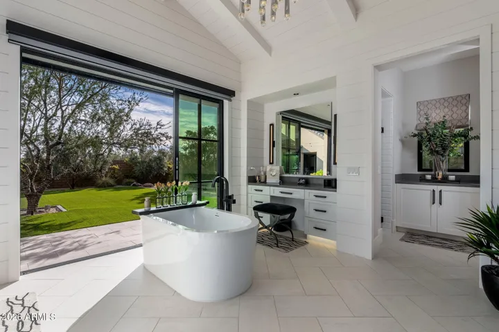 primary bathroom / walk out sliders to backyard
