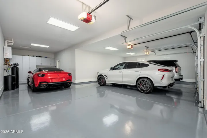 4 car garage with lots of storage & expoxy flooring