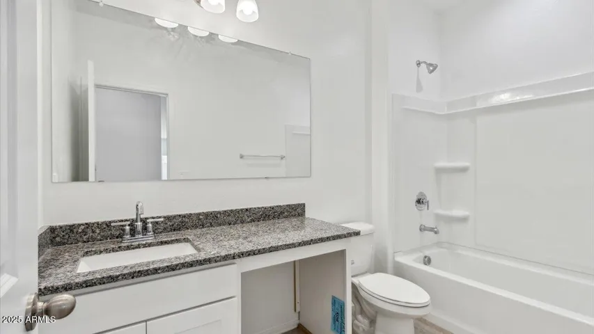 Photos are of a spec and may vary in color, interior selections and design