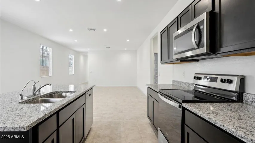 Photos are of a spec and may vary in color, interior selections and design
