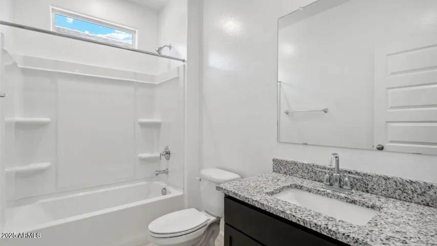 Photos are of a spec and may vary in color, interior selections and design