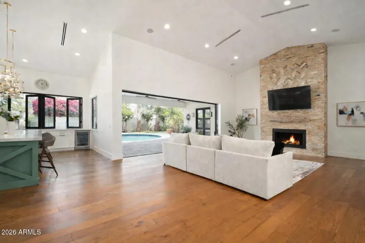 Chicago Brick surrounds the fireplace featuring a reclaimed wood mantle.