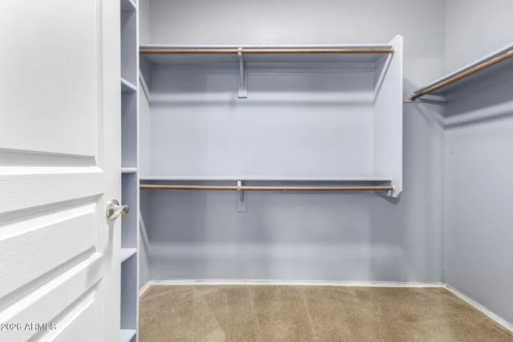 Walk in closet in primary suite