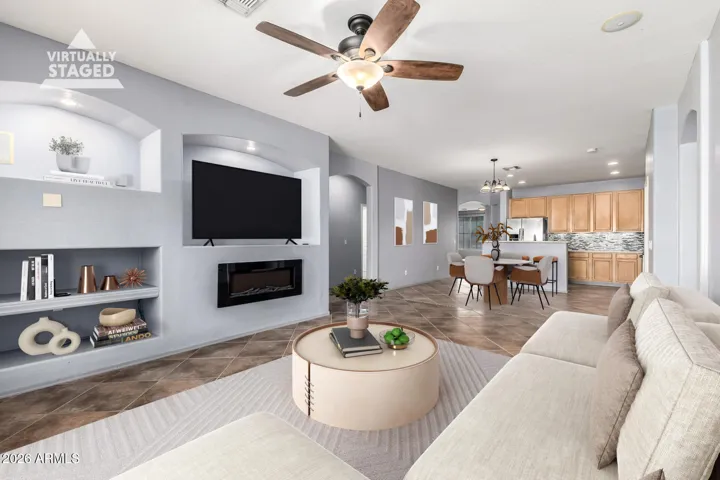 Open floorplan, pool, outdoor kitchen and owned solar panels-no payments for you!!!