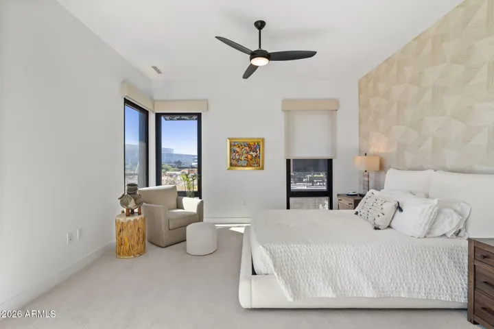Spacious primary suite with abundant natural light and a calm, resort-like feel.