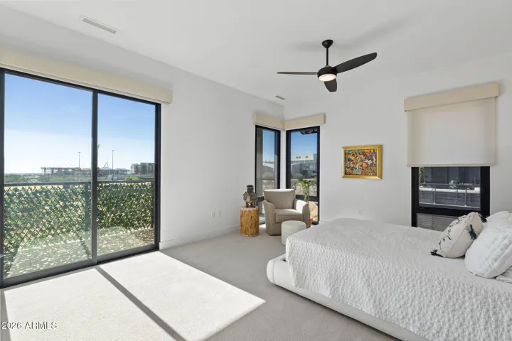 Primary suite featuring expansive windows.