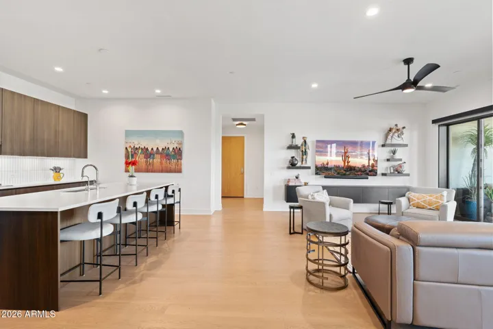 Spacious great room showcasing the open flow between kitchen, dining, and living spaces.