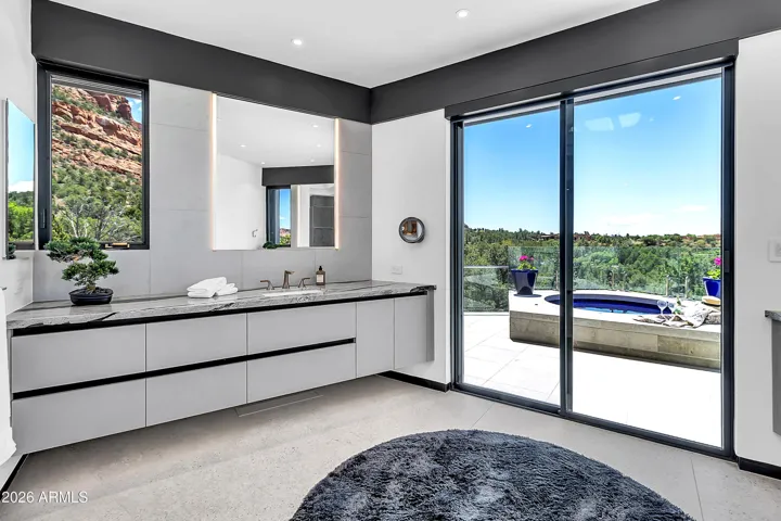 Separate vanities with loads of natural light. And of course there are views.