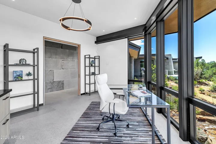 Office has it's own private patio. And built in cabinetry that any office would need.
